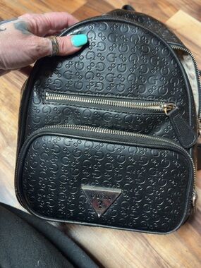 GUESS Black Embossed Logo Mini Backpack with Silver Hardware